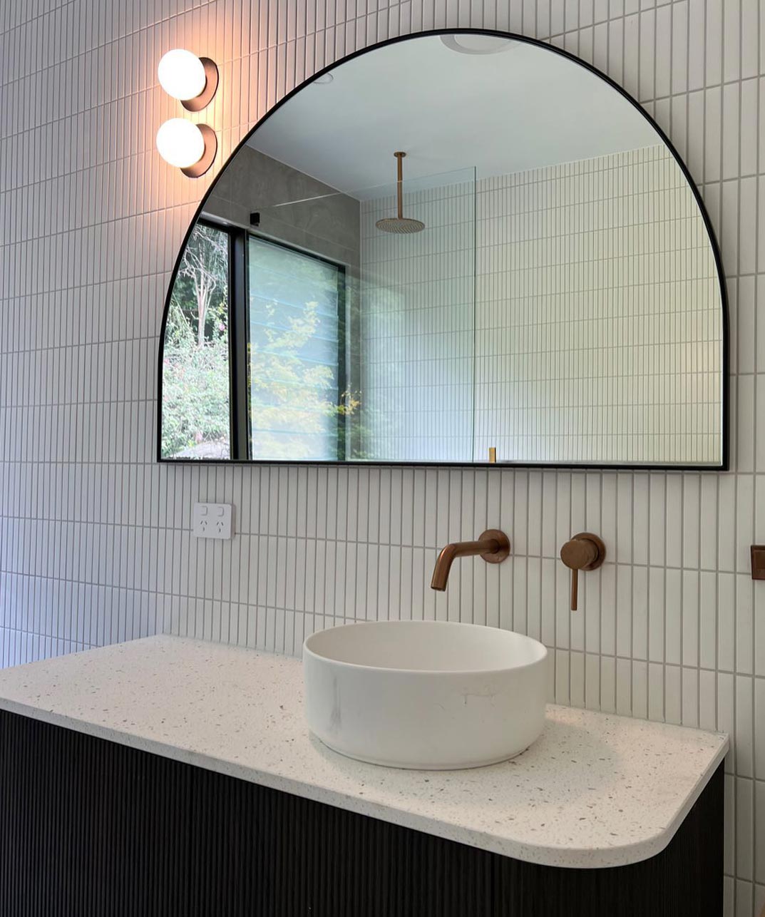 Bathroom with two round lights