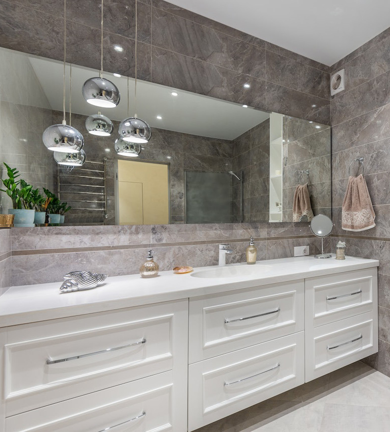 Bathroom with silver pendant lights