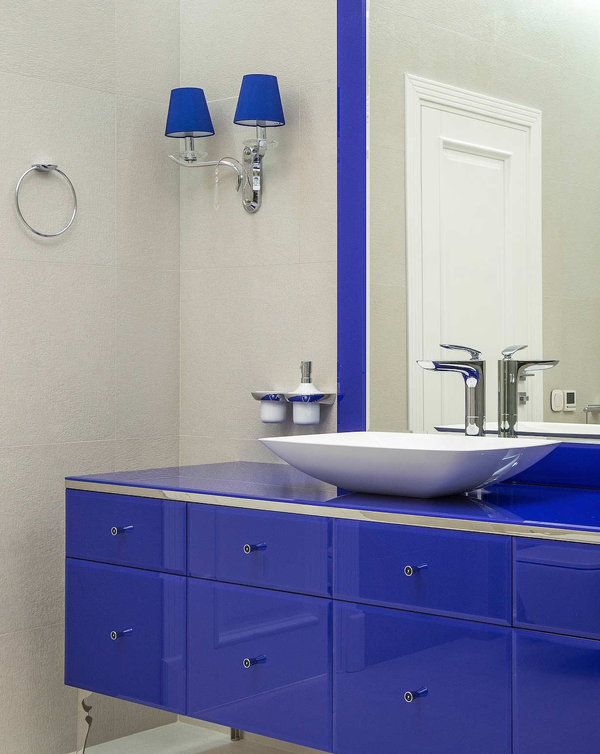 Bathroom with matching cabinet and lampshade color