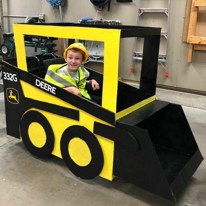Reed’s Ready To Take On The Streets In His John Deere Skid Steer On Trick Or Treat Night, He Says Throw The Candy In The Bucket