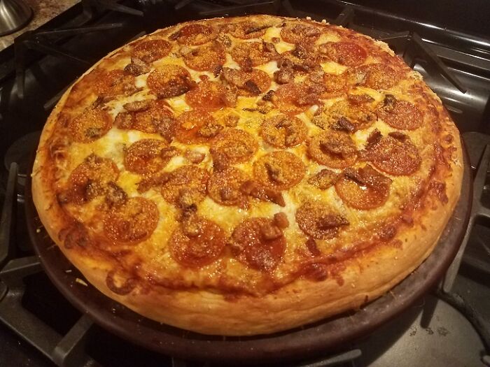 Thick-Crust Pizza With Sausage, Venison, Pepperoni, And Bacon