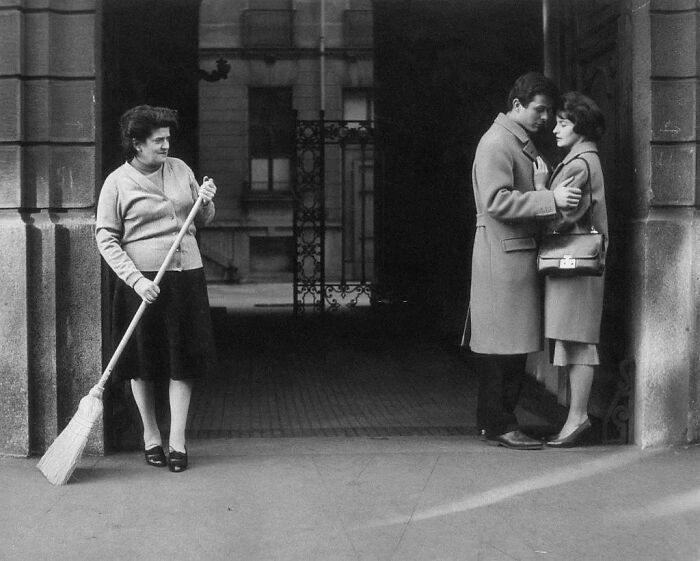 A Doorkeeper Looking At A Couple, 1950s. Photograph By Angelo Cozzi