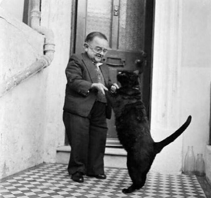 World's Smalllest Man In 1956, Henry Berhens, Dancing With His Cat