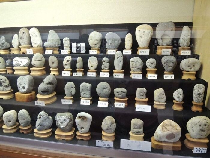 Museum In Japan That Showcases Various Naturally Formed Rocks With Faces On Them