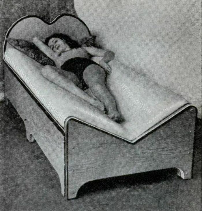 A V-Shaped Bed Invented In 1932, Supporting The Body Perfectly At Every Point And Thus Promotes Better Rest. When Unused The Bed Is Straight Like Every Other Bed. However, One Pull On A Chain At The Side Of The Bed Immediately Changes It To A V-Shape. Another Advantage Claimed For The Bed Is That The Covers Are Held Substantially Away From The Person, Thereby Allowing The Free Circulation Of Air To The Body