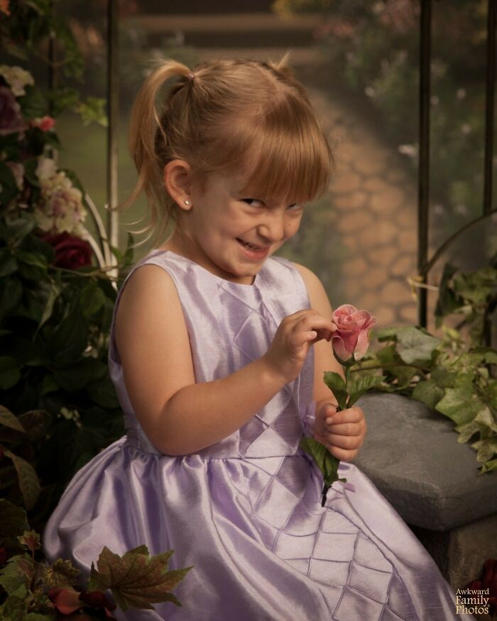 This Picture Was Taken At My Daughter’s Preschool. I Think The Photographer Thought Having Her Hold A Flower Would Make For A Really Cute And Innocent Picture