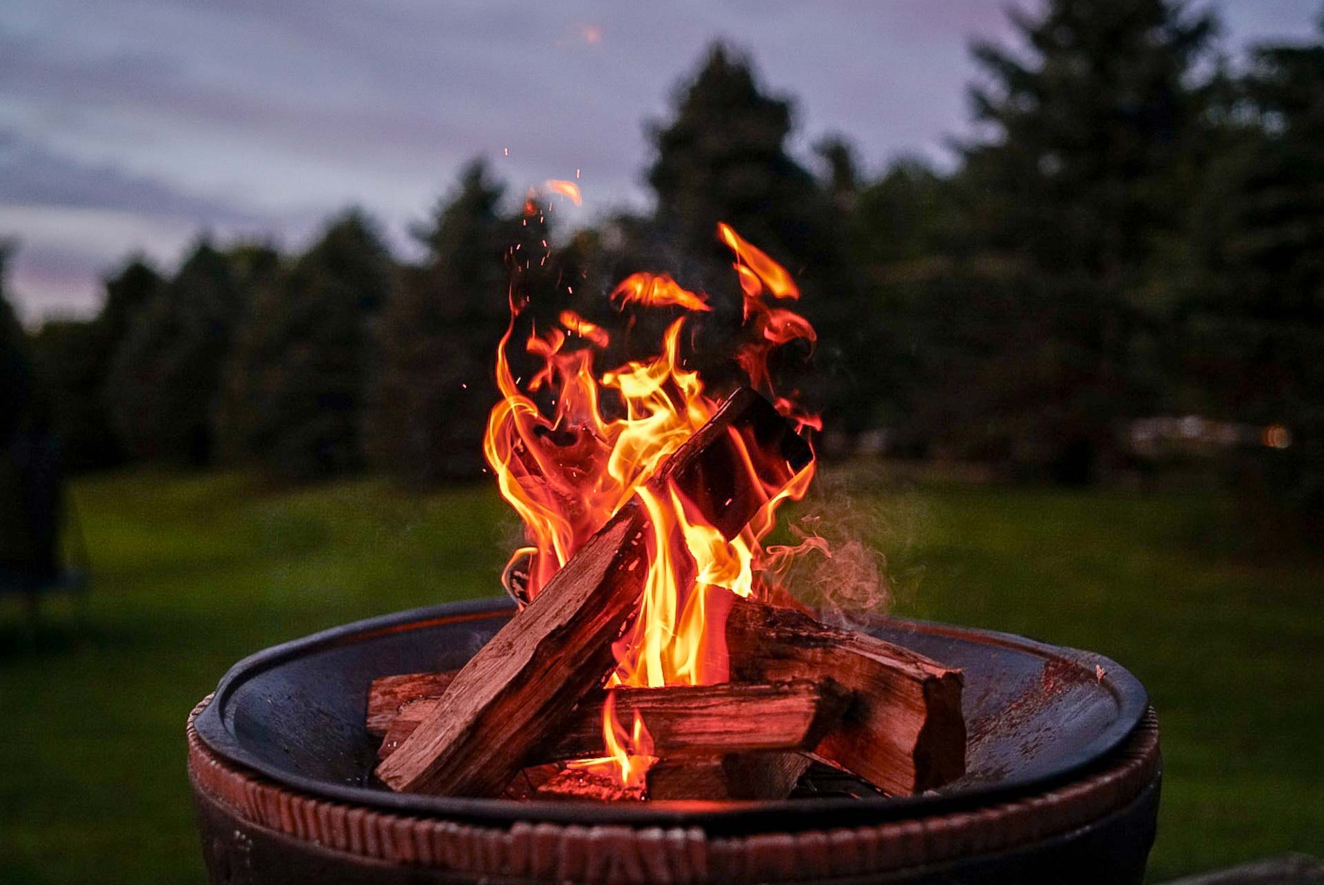 Fire pit with wood on fire