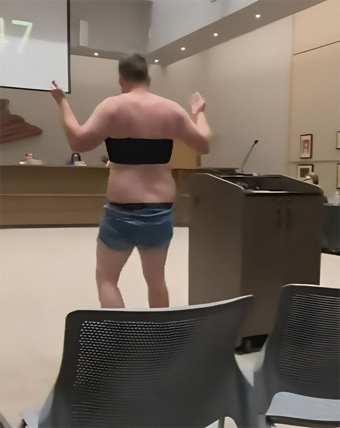 “These Are My Babies”: Dad Strips Down At School Board Meeting To Make A Point On Dress Code
