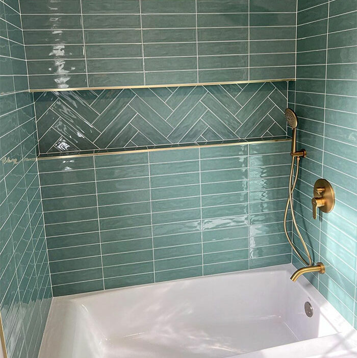 bathroom with green rectangular tiles