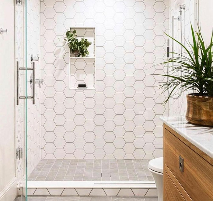 bathroom with white hexagon tiles