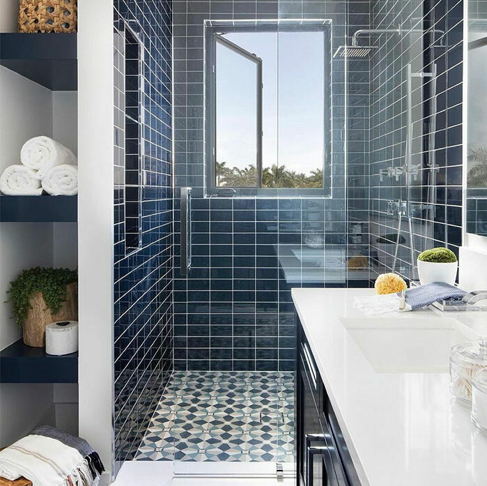 bathroom with different blue tiles