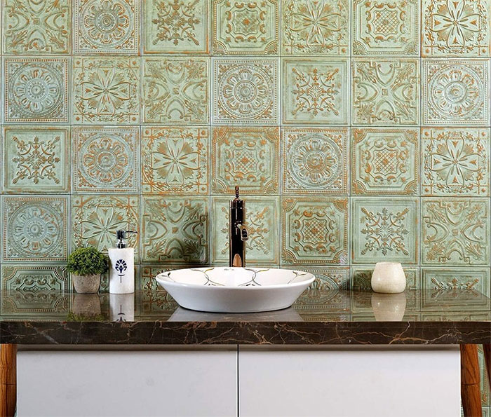 Bathroom with green Morocco tiles and sink
