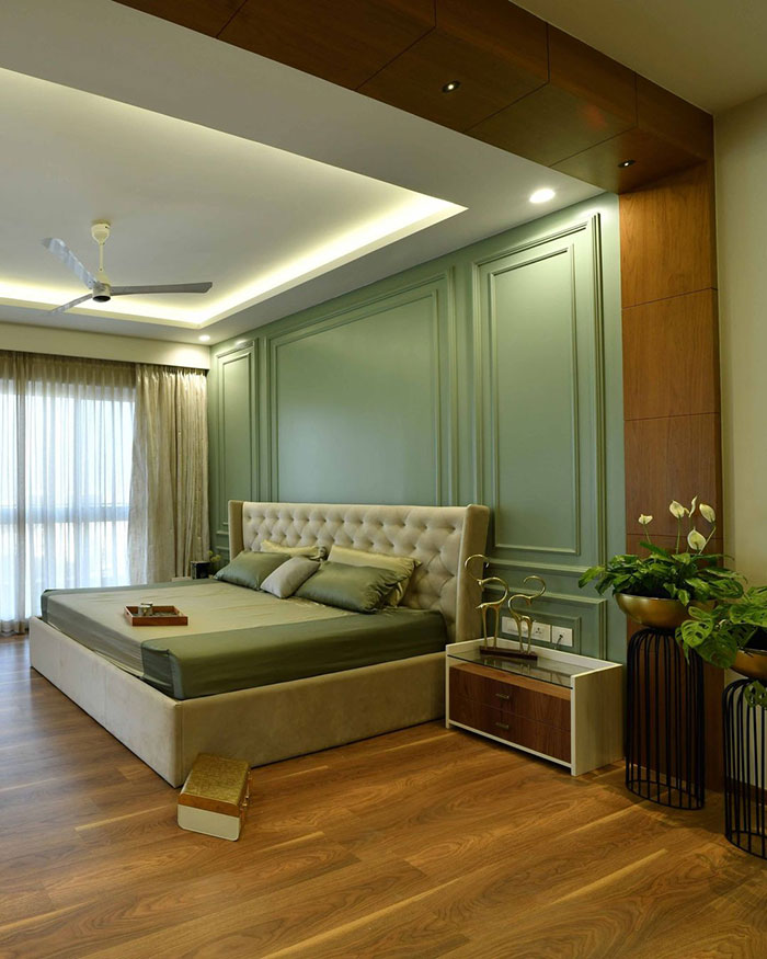 Green moulded wall of bedroom