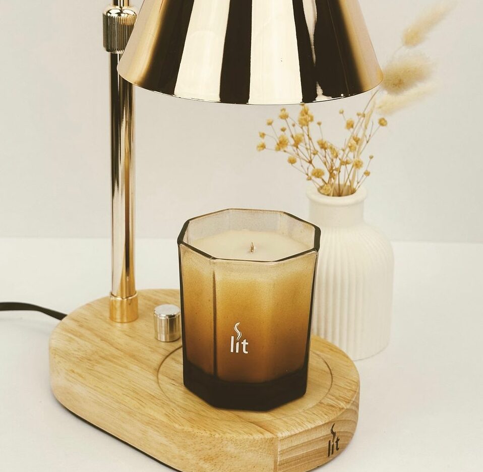 golden and wooden a candle warmer with adjustable temperature knob
