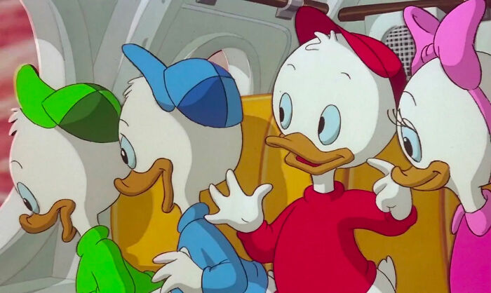 Hewey, Dewie and Louie looking at someone 