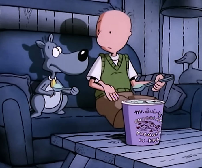 Doug and Porkchop sitting on a couch 