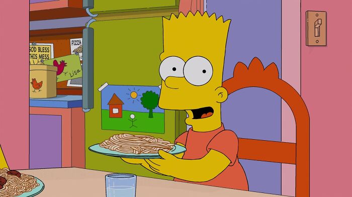 Bart holding plate with spaghetti 