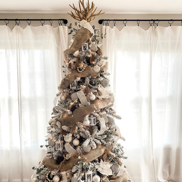 Christmas tree decorated in boho style 