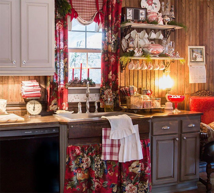 Country kitchen with wooden decor and christmas curtains