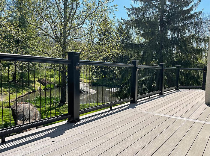 Classic black railing on a wooden porch