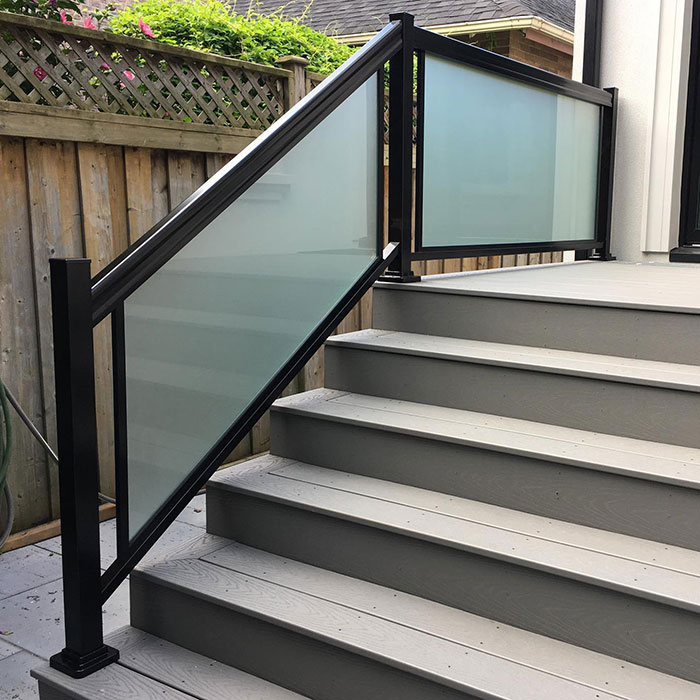 black railing with blurring glass panels to enhance