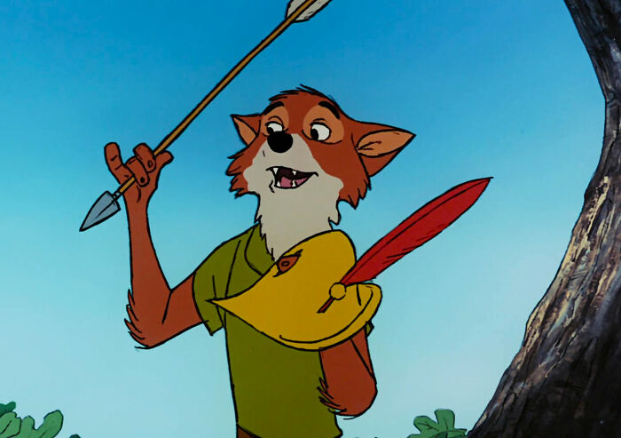 Robin Hood holding arrow and hat