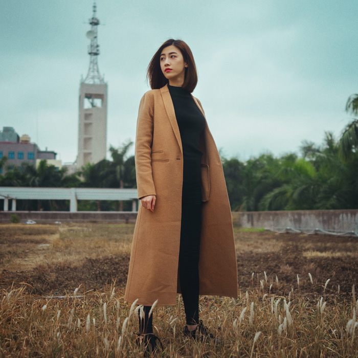 Woman wearing a brown coat 