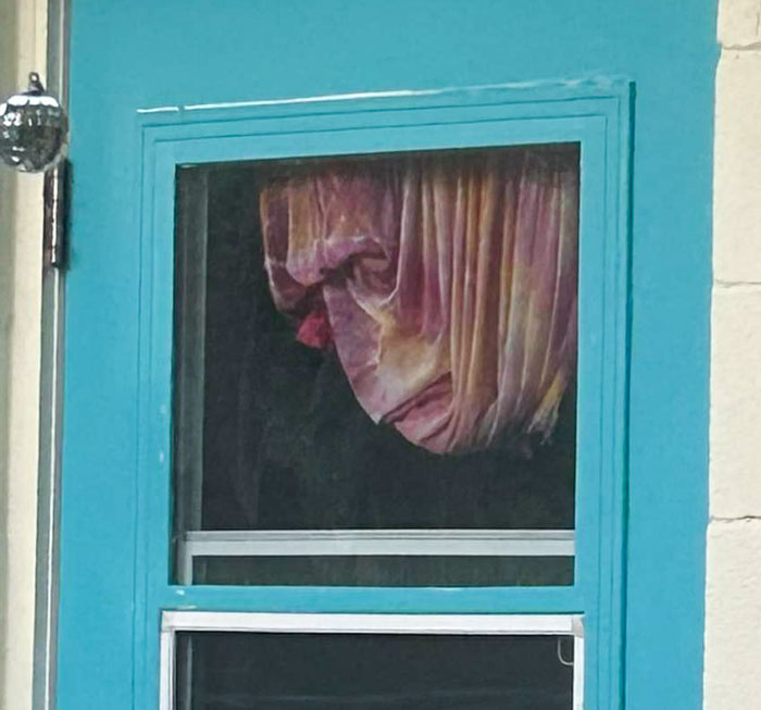 The Folds In This Curtain Creates The Illusion Of A Face