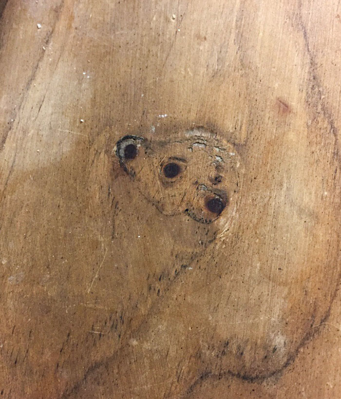 This Knot On This Dresser Looks Like A Smiling Bear