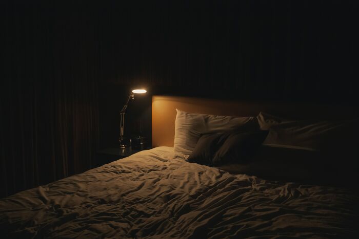 bed with small light
