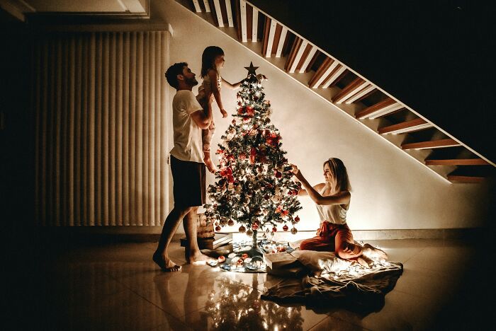 family with christmas tree
