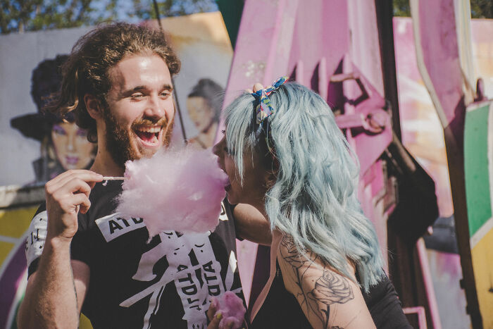 Couple eating cotton candy