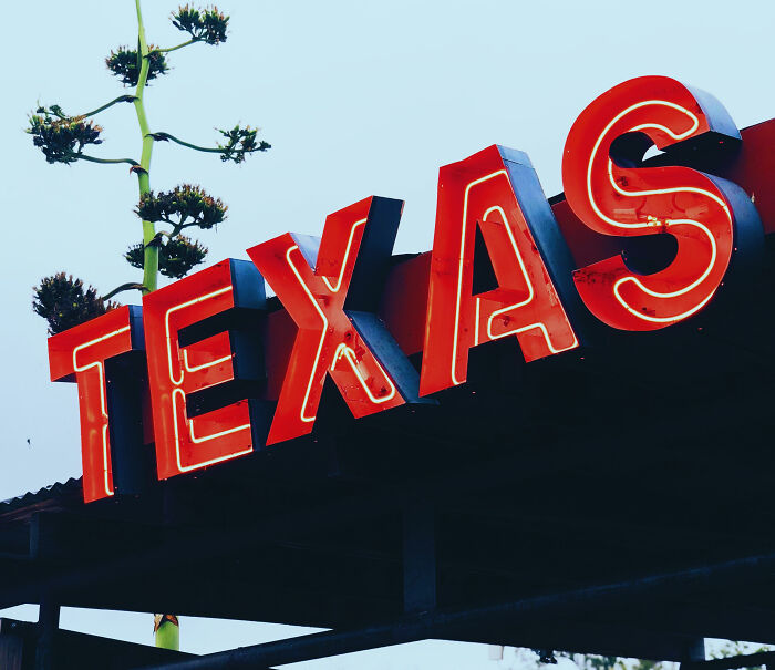 Red Texas store sign