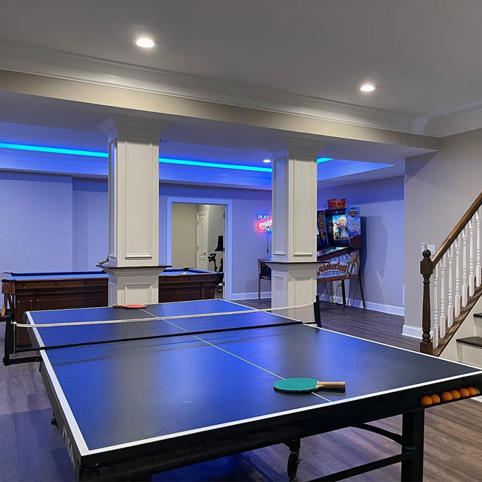 Bright game room and a ping-pong table in it