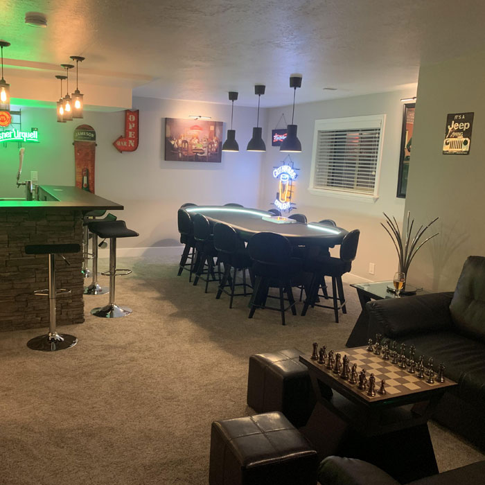 Spacious game room and a poker table 