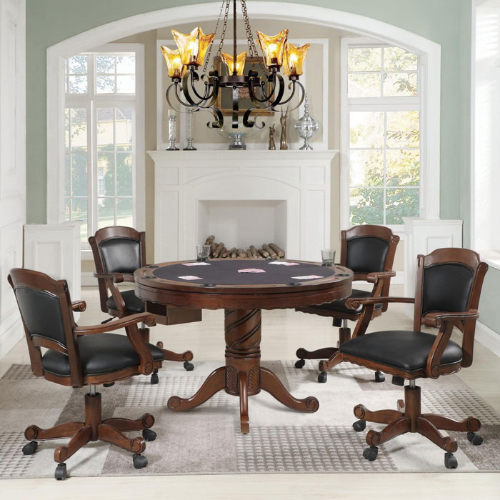 Round wooden table with black leather chairs in a bright game room corner for gaming cave ideas and setup. Round wooden table with black leather chairs in a bright game room corner for gaming cave ideas and setup.