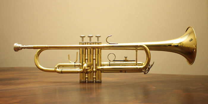 Golden trumpet on the table 