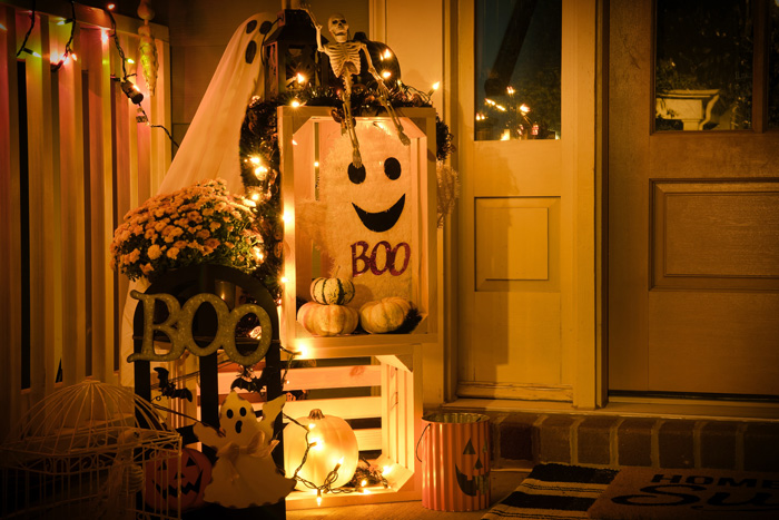 Halloween decorations with ghosts and Boo signs
