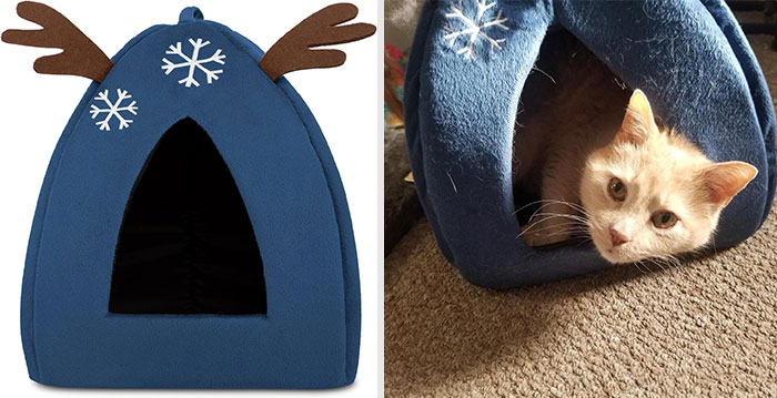 A self-warming cave bed with snowflake embellishments and reindeer antlers that serves as a cozy little oasis for small cats, bunnies, guinea pigs, and other petite, furry friends who want to get into the snuggly holiday spirit.