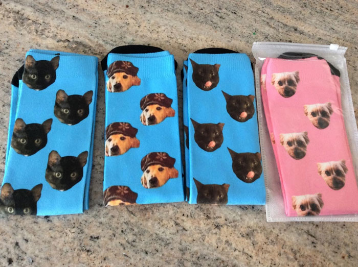 A pair of customizable photo socks that you can plaster with your pet's adorable mug, so now they can warm your heart and your feet.