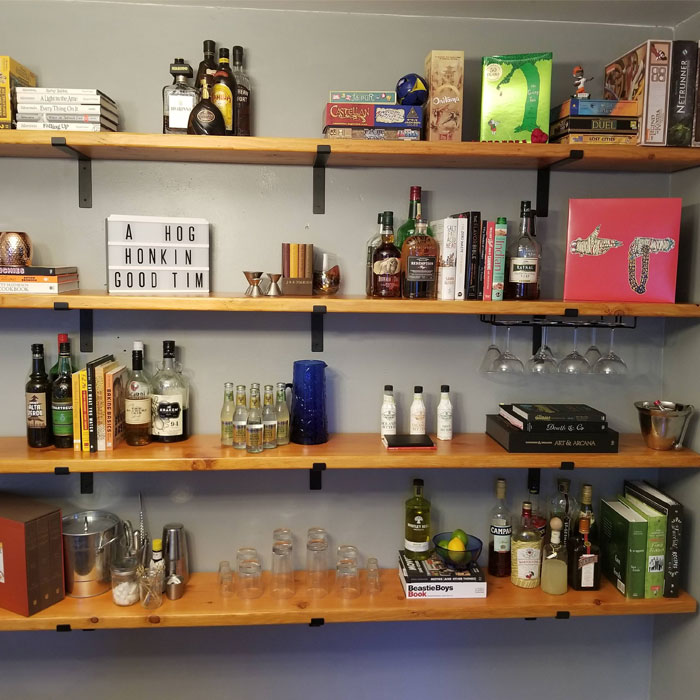 Books and drinks in a shelf 