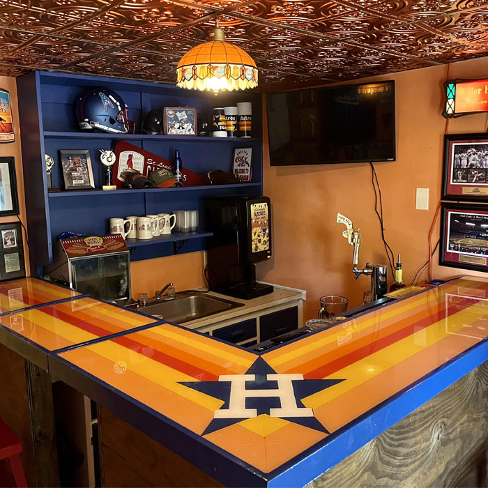 Sports themed colorful home bar 