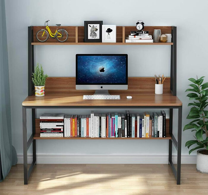 wooden and metal desk with storages, books and computer