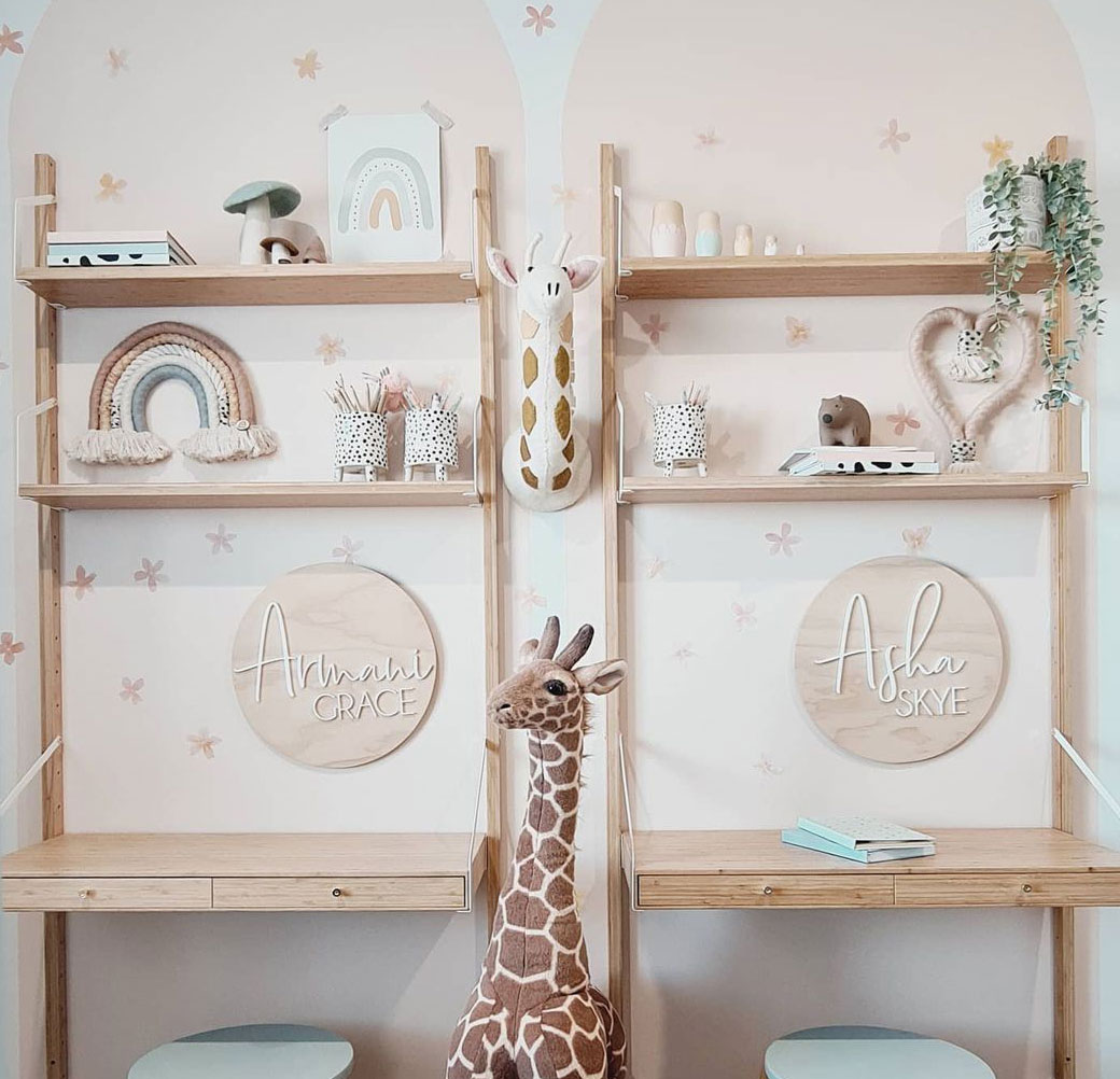 Kids bookshelves with nameplates