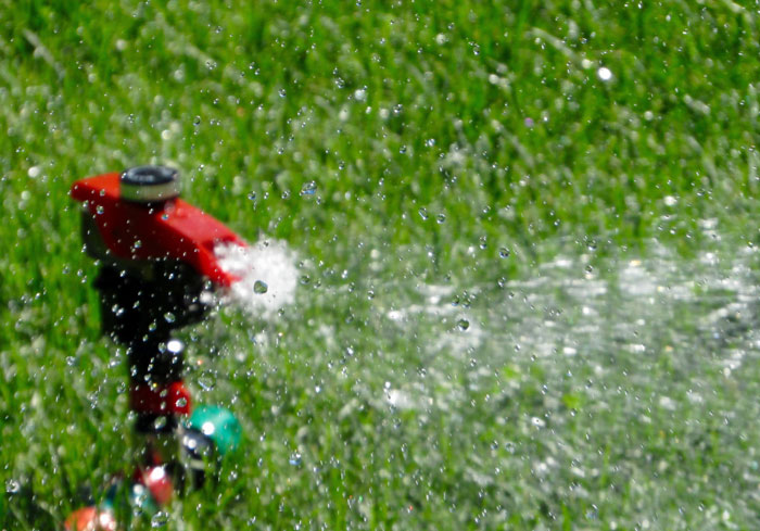 Red garden sprinkler Red garden sprinkler