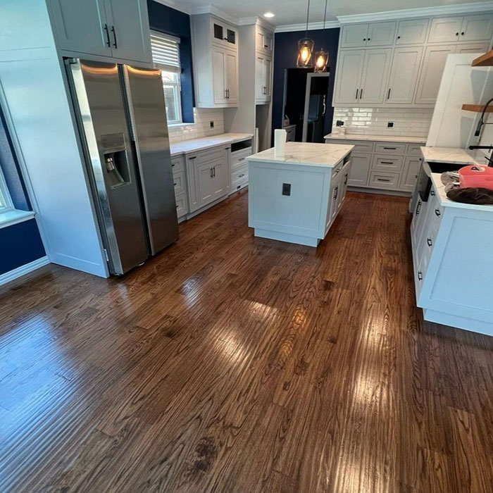 English chestnut floor in a modern kitchen showcasing rich wood tones and Minwax stain colors for wood stain selection. English chestnut floor in a modern kitchen showcasing rich wood tones and Minwax stain colors for wood stain selection.