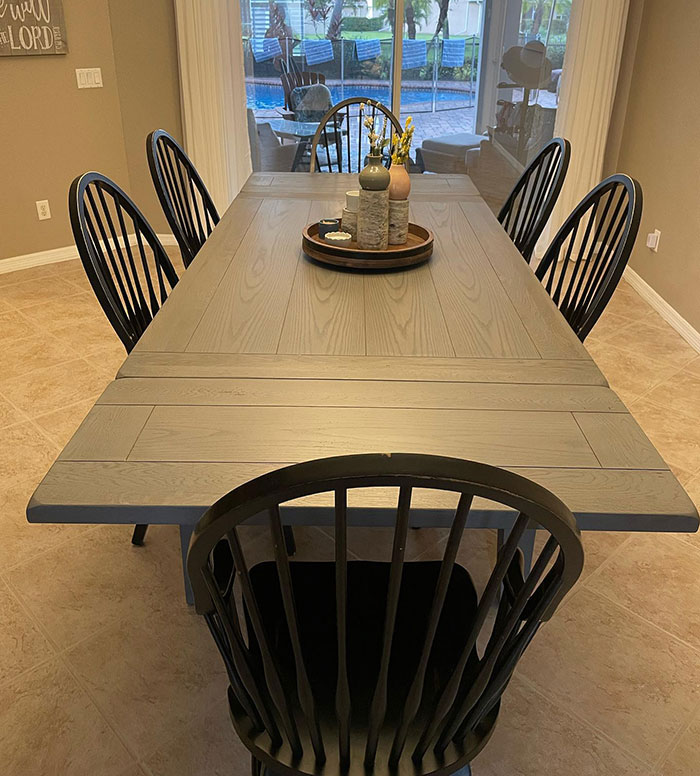 Gray toned wood table with black chairs in a bright room showcasing Minwax stain colors for wood stain color choices Gray toned wood table with black chairs in a bright room showcasing Minwax stain colors for wood stain color choices