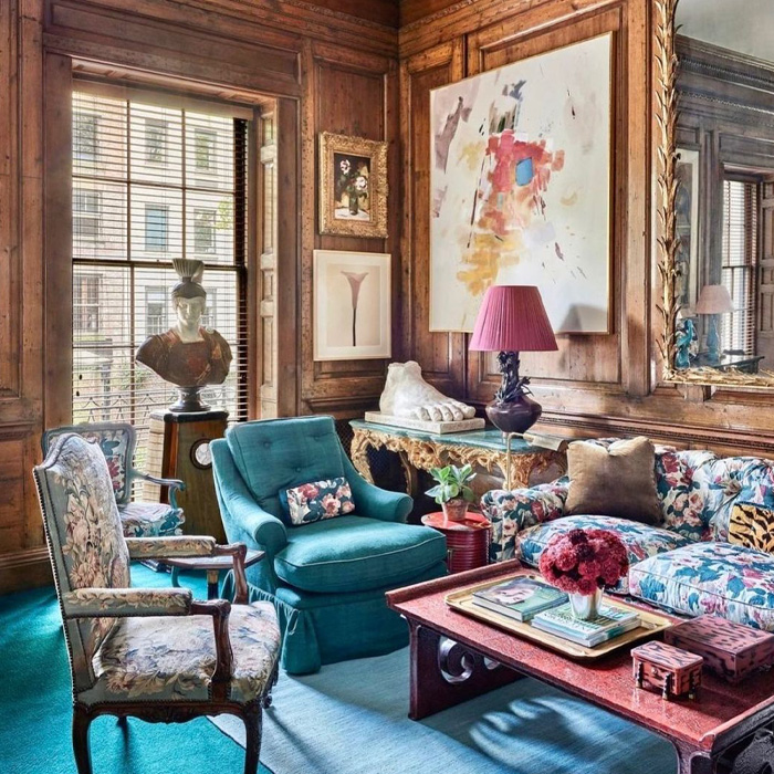 Room featuring colorful furniture, classic artwork, and elegant touches exemplifying old money interior design style. Room featuring colorful furniture, classic artwork, and elegant touches exemplifying old money interior design style.