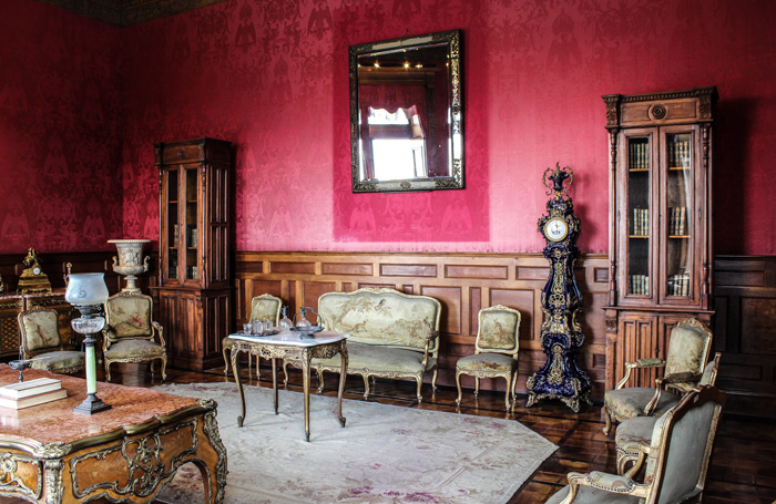 Empty living room with vintage furniture and decor showcasing old money interior design style and classic elegance. Empty living room with vintage furniture and decor showcasing old money interior design style and classic elegance.