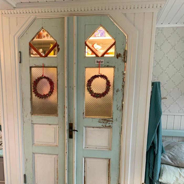 Green and white wooden pantry door Green and white wooden pantry door